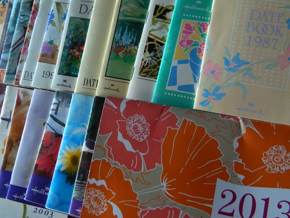 A spread of datebooks from 01987 to 02013
